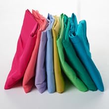 pile of shorts showing the rainbow of new colors in cotton fabric