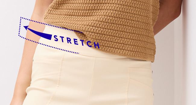 front of pant with a little diagram showing the stretchability of the waistband