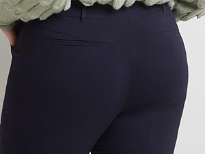 Back view of model wearing pant in navy