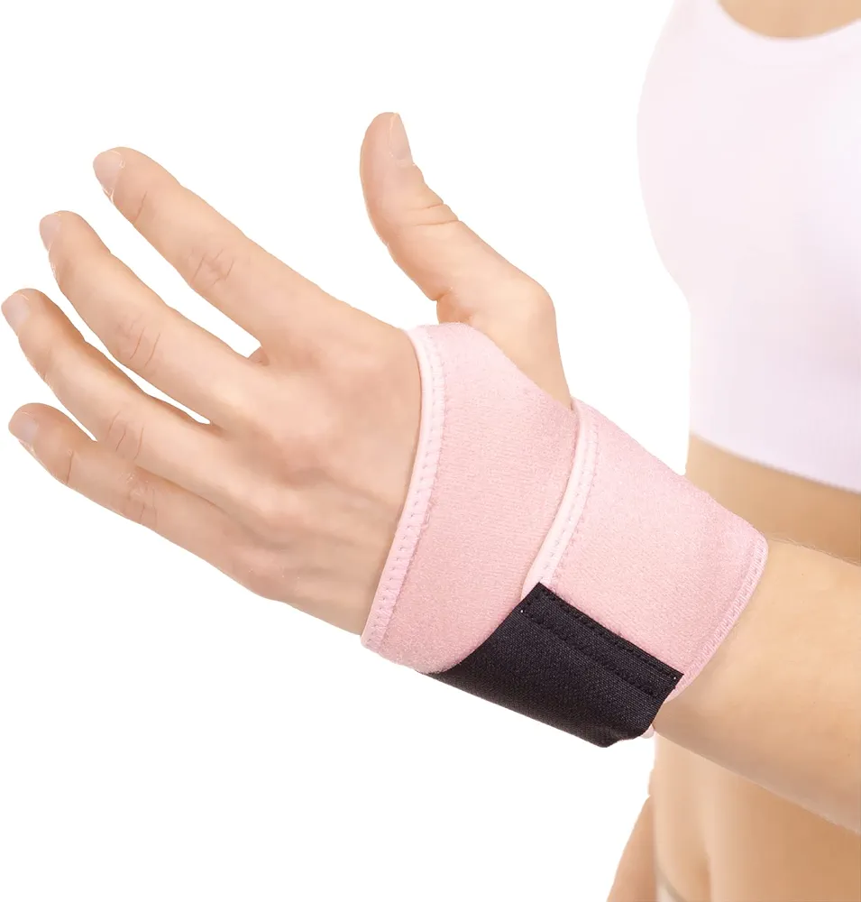 BraceAbility Women's Wrist Support Brace - Pink Right or Left Mommy Hand Copper Compression Wrap for Pregnancy Carpal Tunnel Pain Relief, De Quervain's Tenosynovitis Treatment, Arthritis Joint Pain